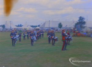 Photographic negative [faulty] of Dagenham Town Show 1973 at Central Park, Dagenham, showing military band [possibly Marines] parading in arena, 1973