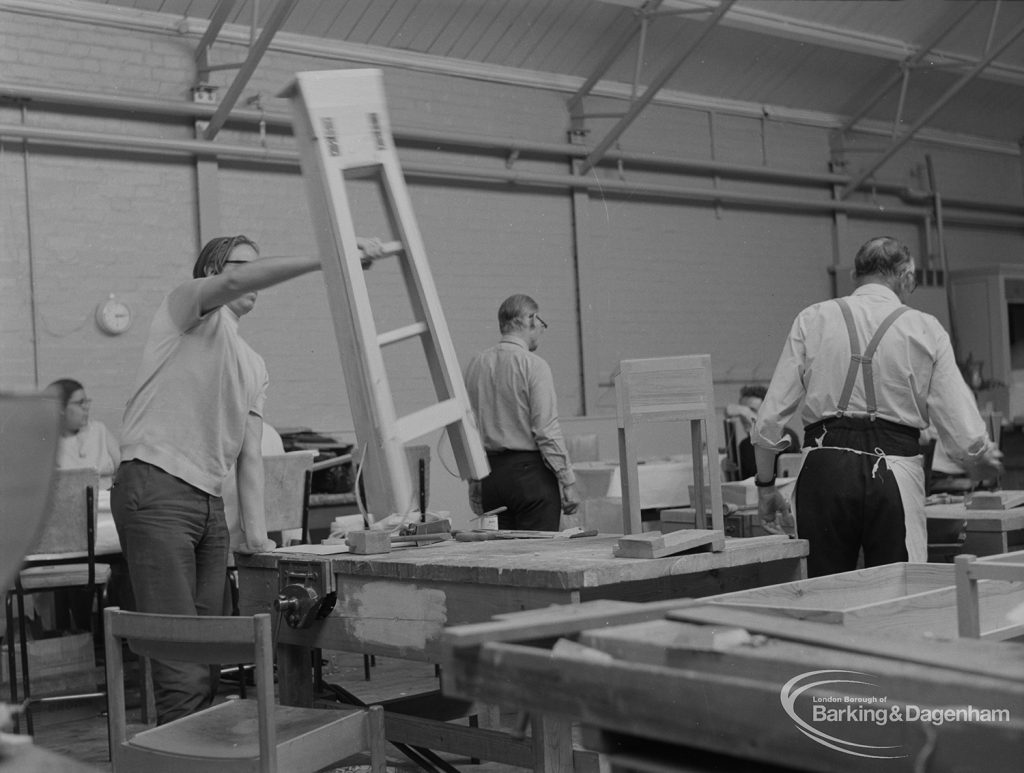 Welfare for the Blind, showing blind craftsman working on stepladder in carpentry shop and others, 1973