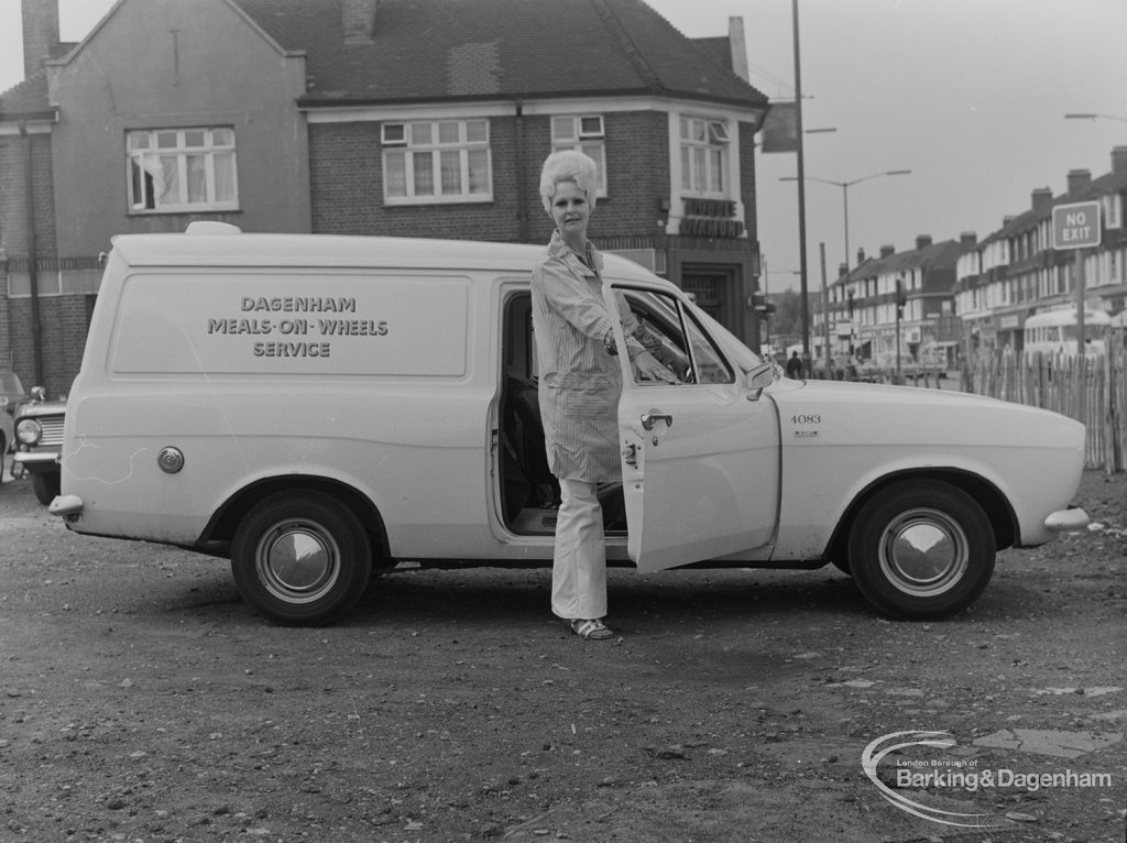 Dagenham Meals-on-Wheels Service van and driver in car park in Barking, 1973