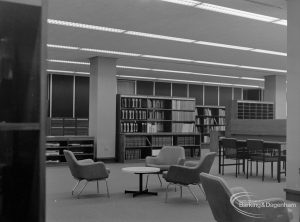 New Barking Central Library, Axe Street, Barking, showing bookcases, table and armchairs in Reference section, 1974