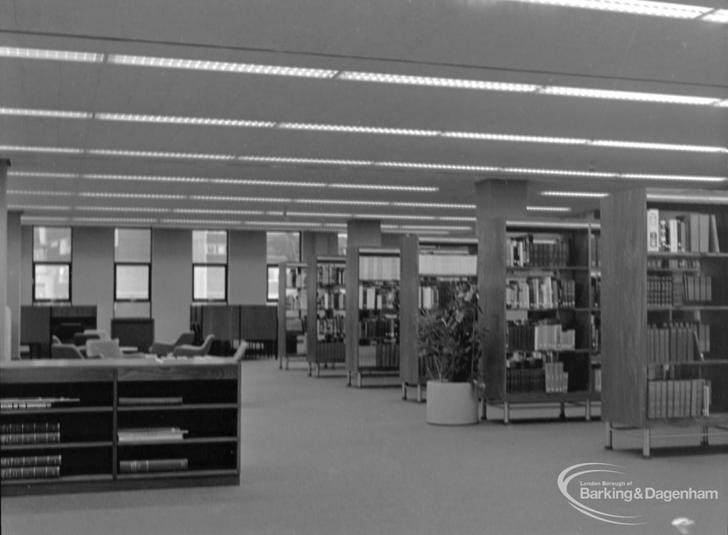 New Barking Central Library, Axe Street, Barking, showing bookcases and cabinet in Reference section, 1974