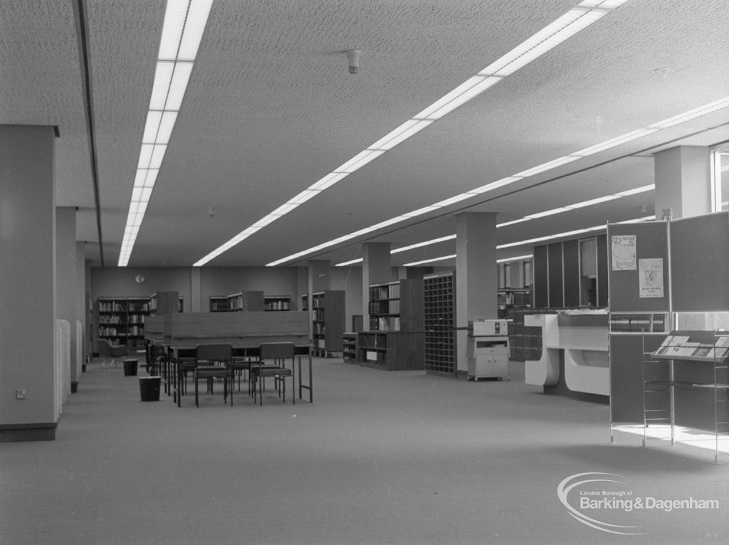 New Barking Central Library, Axe Street, Barking, showing general view of counter area, chairs and study desks in Reference section, 1974