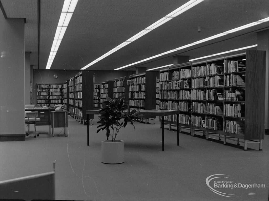 New Barking Central Library, Axe Street, Barking, showing Lending section, central area of bookcases taken from south, 1974