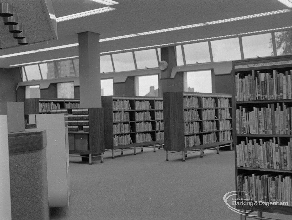 New Barking Central Library, Axe Street, Barking, showing Lending section with bookcases to west, 1974