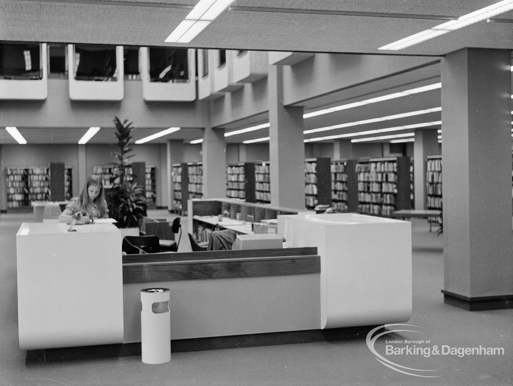 New Barking Central Library, Axe Street, Barking, showing Lending section with staffed counter, 1974