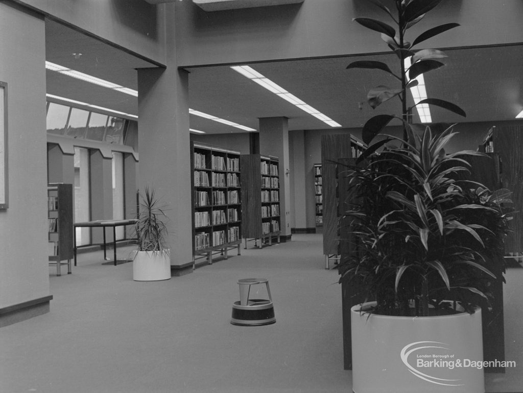 New Barking Central Library, Axe Street, Barking, showing plants by public catalogue cabinet in Lending section, looking north-west to bookcases, 1974