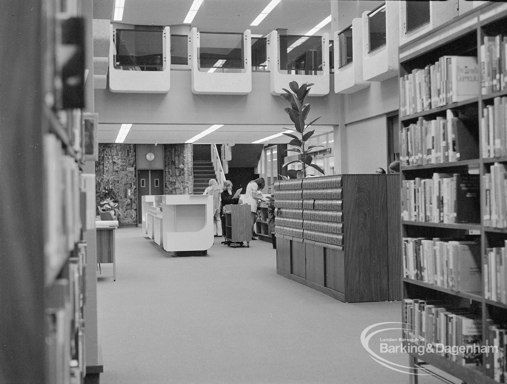 New Barking Central Library, Axe Street, Barking, showing Lending section with view of area behind counter, looking south, 1974