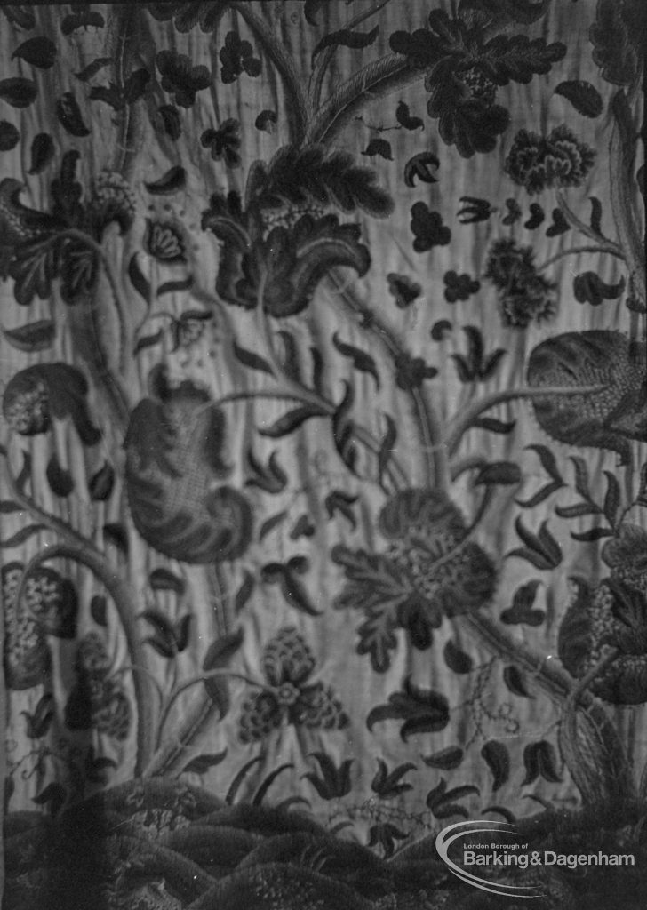 Detail of embroidered seventeenth century curtain on loan from Victoria and Albert Museum to Valence House, Becontree Avenue, Dagenham, removed for photograph from room opposite Period Room, 1975