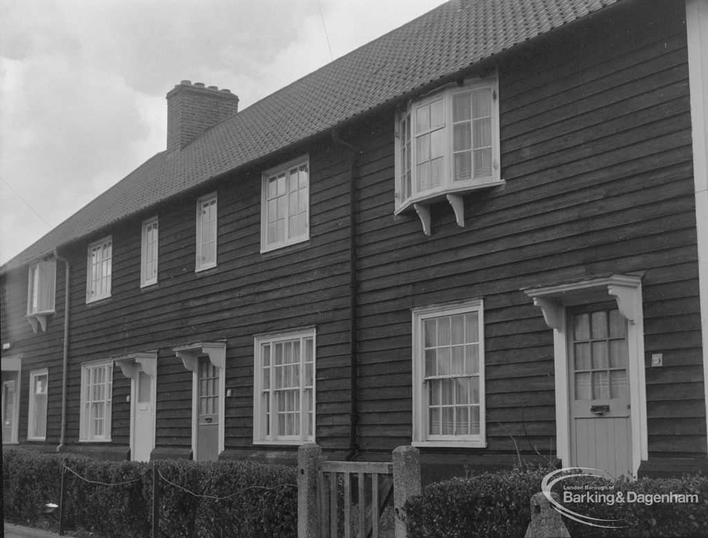 Timber housing in Green Lane, Dagenham, showing north side of four houses at 915 – 911 Wood Lane and new porch, 1977