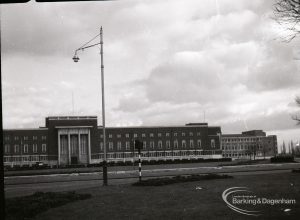 The Civic Centre, Dagenham, showing remote view of south half of the building, and with new extension, taken from roundabout, 31 January 1965