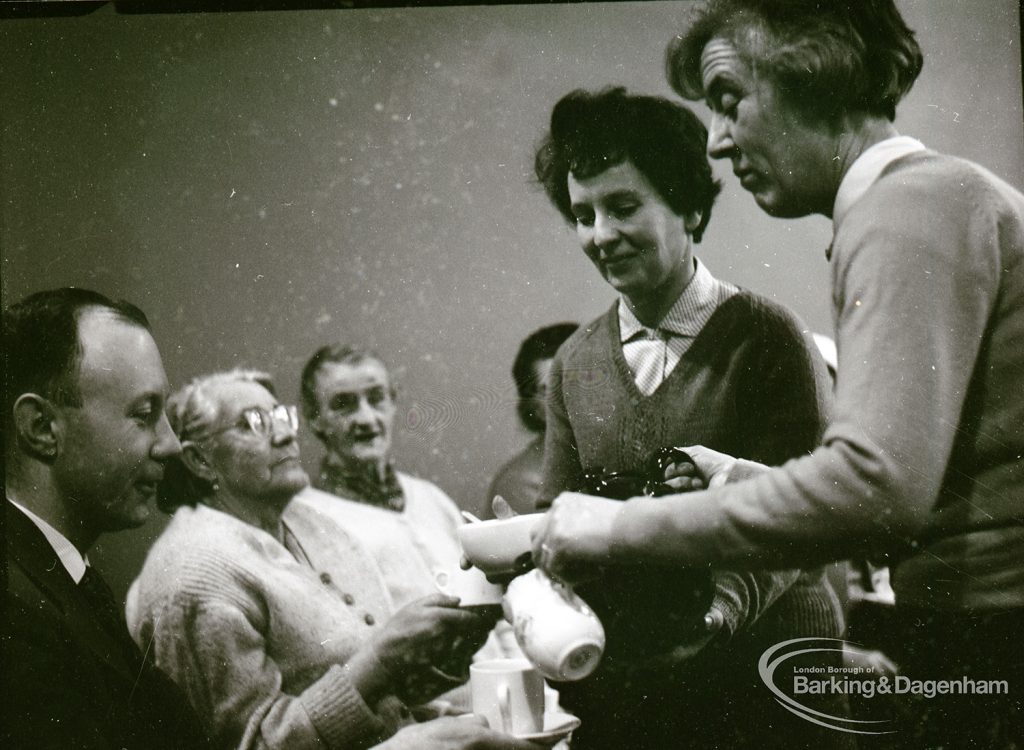 Public health and elderly people’s welfare, showing helpers serving cups of tea, with two women and Doctor Parker, at Oxlow Lane Clinic, Dagenham, 4 February 1965