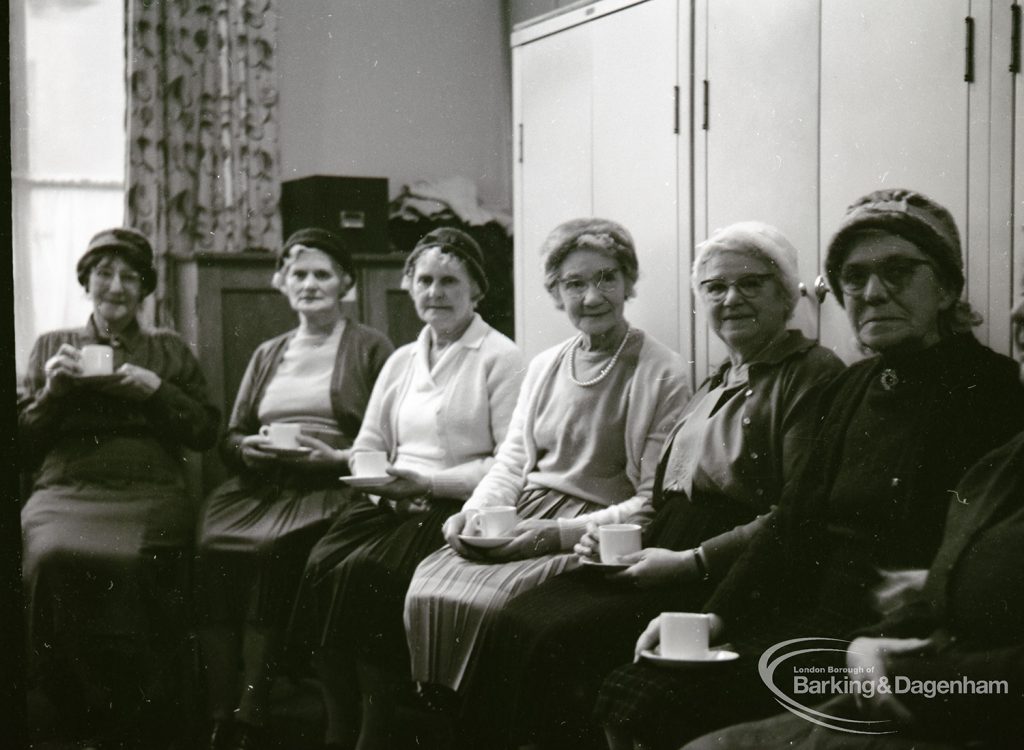 Public health and elderly people’s welfare, showing six women drinking cups of tea at Oxlow Lane Clinic, Dagenham, 4 February 1965
