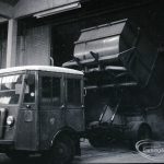Dagenham Council salvage, showing close up view of new type dustcart discharging effluent, 9 February 1965