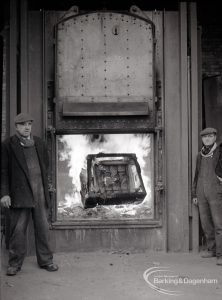 Dagenham Council salvage, showing new incinerator with fire blazing, and with two workmen, 9 February 1965