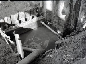 Dagenham Council Sewage banks reconstruction, showing ?well? at base of drain, 1965