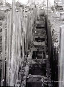Dagenham Council Sewage banks reconstruction, showing view looking into deep trench, 1965
