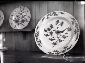 Victoria and Albert exhibition of Delftware pottery at Rectory Library, Dagenham, showing a plate and a smaller plate, 1965