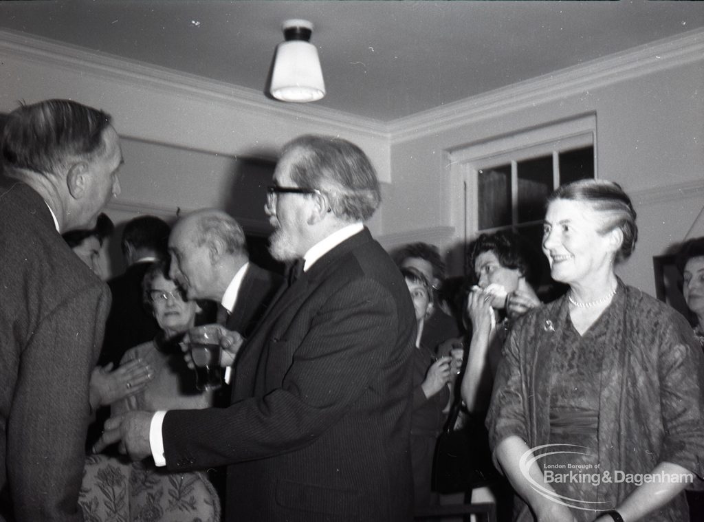 Mr and Mrs John Gerald O’Leary talking with Mr W C Pugsley after the presentation, on the occasion of the retirement of Borough Librarian John Gerald O’Leary, 1965