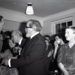 Mr and Mrs John Gerald O’Leary talking with Mr W C Pugsley after the presentation, on the occasion of the retirement of Borough Librarian John Gerald O’Leary, 1965