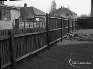 Wantz Sewer Environment scheme, showing paling fence and houses, taken from garden, 1965