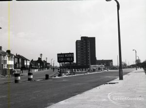 Road construction in Rainham Road South, Dagenham, showing junction of new and old roads looking east,1965