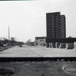 Road construction in Rainham Road South, Dagenham, showing table of concrete for new road looking east,1965