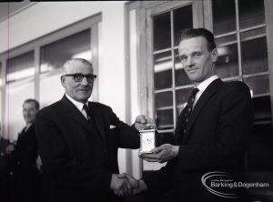 Dagenham Borough Surveyor and Engineer Mr Jack Jones receiving presentation clock, 1965