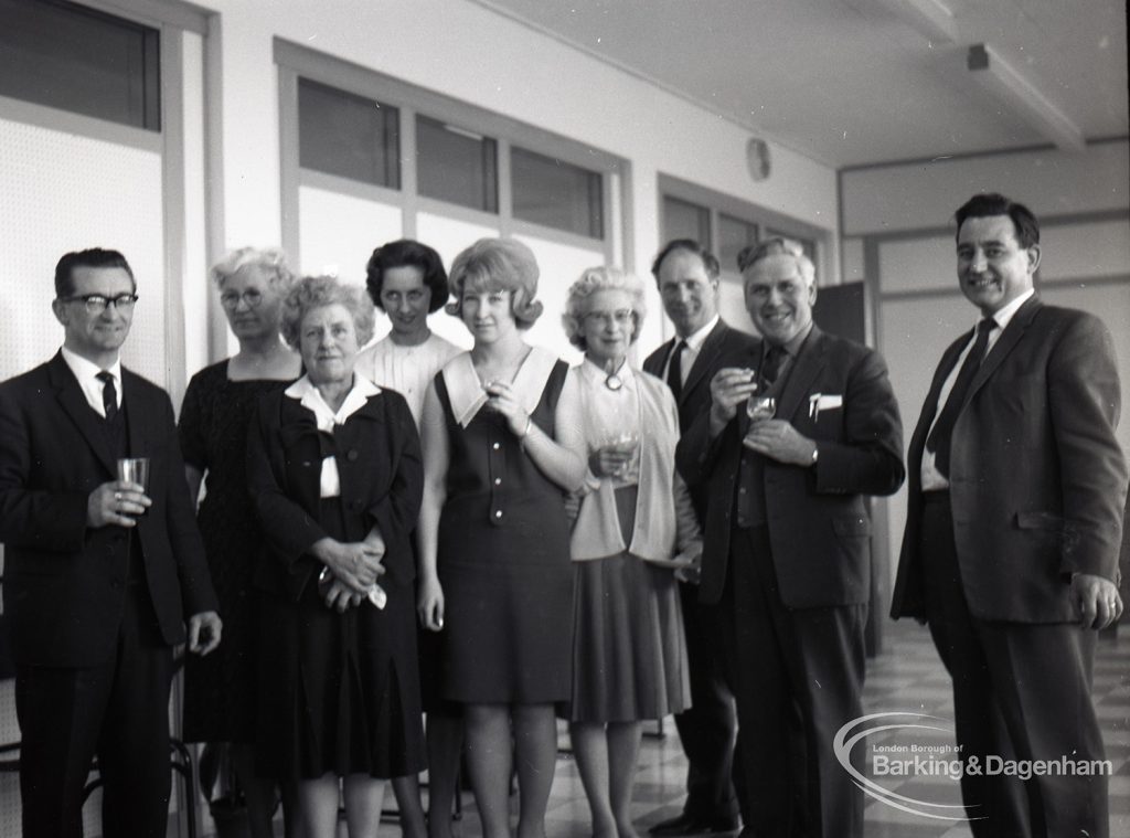 Reception for Dagenham Borough Surveyor and Engineer Mr Jack Jones, showing group of staff including Mr Banks from Heating, 1965