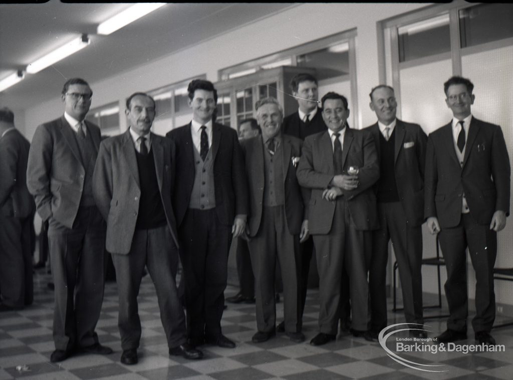 Reception for Dagenham Borough Surveyor and Engineer Mr Jack Jones, showing group of staff including colleagues from Heating and Electricity, 1965