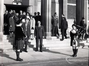 Reception for Dagenham Borough Surveyor and Engineer Mr Jack Jones, showing group of staff on steps of Civic Centre with Dagenham Girl Pipers, taken from north-west, 1965