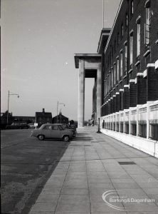 Front exterior of Civic Centre, Dagenham, taken from south and showing parked car, 1965