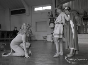 Dagenham Secondary school play, with children performing Androcles and the Lion, showing Androcles shielding the Emperor from Lion, 1965