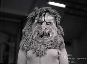 Dagenham Secondary school play, with children performing Androcles and the Lion, showing mask of the Lion, 1965