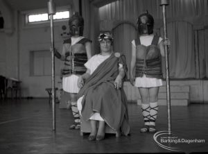 Dagenham Secondary school play, with children performing Androcles and the Lion, showing the Emperor attended by two soldiers, 1965