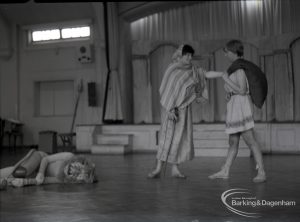 Dagenham Secondary school play, with children performing Androcles and the Lion, showing Androcles, Megaera, and sleeping Lion, 1965