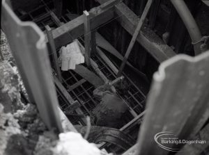 Dagenham Sewage Works Reconstruction IV, showing workman at bottom of trench,1965