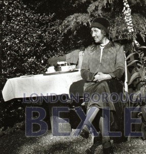PHBOS_2_1369 Lady taking tea in the garden c1920