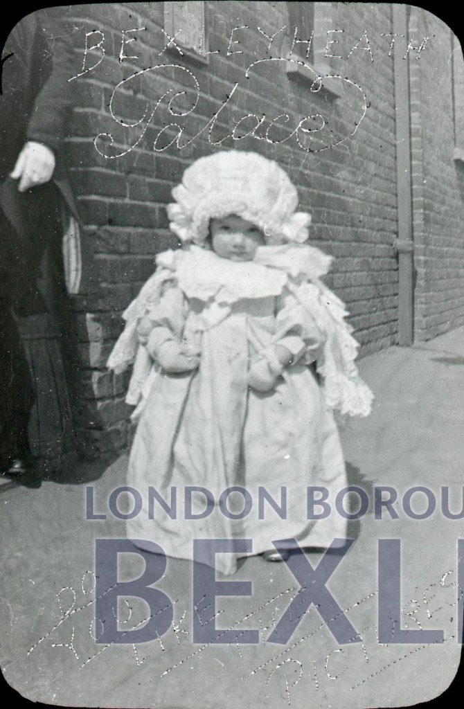 Small child outside Palace cinema, Bexleyheath 1900