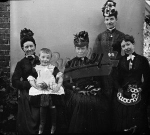 Four women with child,  Late 19th early 20th Century.