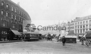 High Street, Camden Town, NW: [looking north from junction with Crowndale Road, showing the Cobden statue]