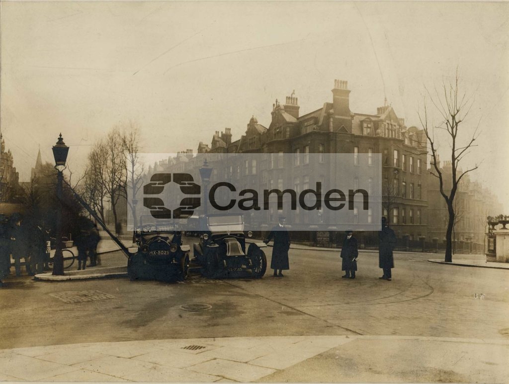 View of a road accident between two cars in the Finchley Road at the junction of Cannon Hill and Heath Drive