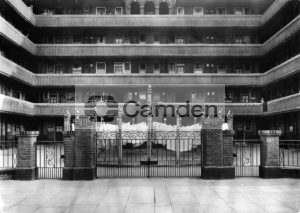 Gates with bird design at entrance to courtyard of St Francis Flats