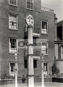 Detail of St Martin and ships on finials of drying posts of St Martin's House