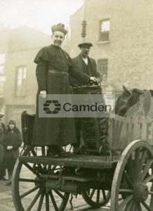 Fr Jellicoe and coalman Mr Tattershall on coal cart