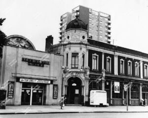 Kenninghall Cinema and The White Hart public house, Lower Clapton Road, Hackney. 1965. Includes Gooch House in background.