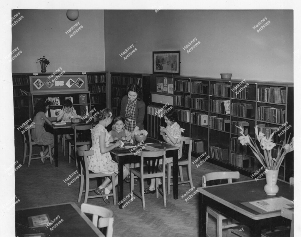 Hackney Library, Clapton branch. 1958. Includes children involved in arts and crafts activities