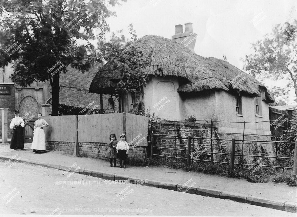 Thatched cottage at west end of Spring hill. 1895.