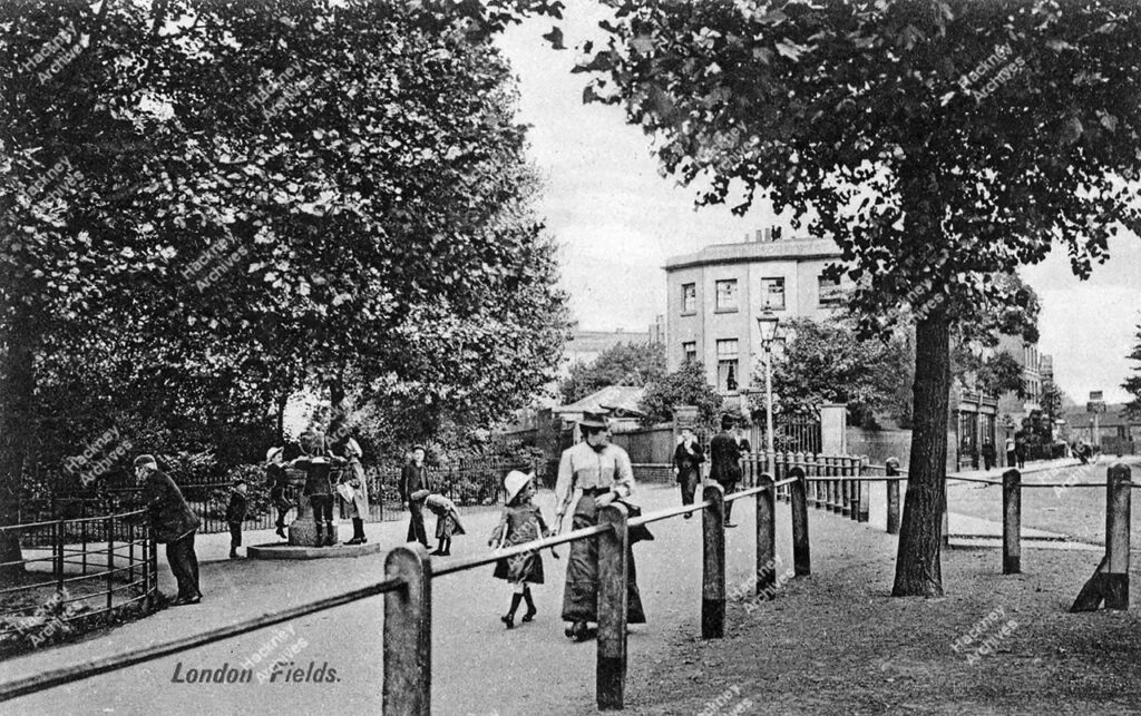 London Fields, pathways meeting by drinking fountain at end of Martello Terrace; showing Martello Street and The Queen Eleanor pub, c.1890