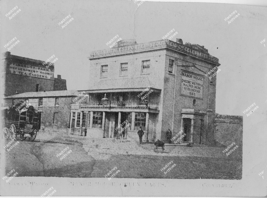 The Manor House public house on Green Lanes (now site of Manor House tube station). Includes sign on wall ‘Queene Victoria Halted Here 25 Oct 1843’, c.1870.