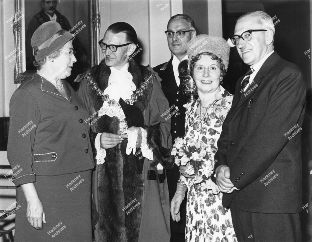 Stoke Newington Metropolitan Borough Council Mayor making ceremony, with Alderman John Cox. Includes Alderwoman Mrs Cox, Mayoress Cllr. Mrs Calfe, Deputy Mayor. 1961.
